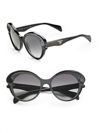Sophisticated design in a round shape with swirl accents. Available in black with gradient blue lens, havana brown with gradient brown lens, or tortoise/black with brown gradient lens.Acetate frame with crystal lens Prada logo on temple 100% UV protective Made in Italy Sophisticated design in a round shape with swirl accents. Available in black with gradient blue lens, havana brown with gradient brown lens, or tortoise/black with brown gradient lens.Acetate frame with crystal lens Prada logo on temple 100% UV protective Made in Italy