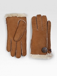 Keep your hands warm in this perforated shearling sheepskin design in soft suede or supple leather with button loop detail. About 8½ long Imported Fur origin: Spain