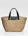 Woven straw design pairs with lustrous leather trim in this roomy carryall.Leather double top handles, 6 dropFlap-lock closureOne inside zip pocketFully lined13W X 11H X 5¼DMade in Italy