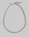 Simple and sophisticated, a bold chain of sterling silver with a signature tag at the clasp. Sterling silver Length, about 20 Lobster clasp Made in Bali