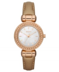 A ravishing look by DKNY. This darling watch shimmers with rosy sparkle and supple leather. A ravishing look by DKNY. This darling watch shimmers with rosy sparkle and supple leather.