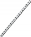 Match point. A seamless row of round-cut diamonds (6 ct. t.w.) epitomize perfection in this stunning tennis bracelet. Crafted in 14k white gold. Approximate length: 7-1/4 inches.