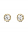 Pretty as a picture! Swarovski's framed crystal stud earrings are equally chic for a day at the office or a night on the town. Made in gold tone mixed metal. Approximate diameter: 1/2 inch.
