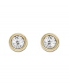 Pretty as a picture! Swarovski's framed crystal stud earrings are equally chic for a day at the office or a night on the town. Made in gold tone mixed metal. Approximate diameter: 1/2 inch.