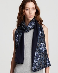 Magnificently moody in rich shades of blue, this Burberry Prorsum floral scarf will finish off denim and dresses with equal ease. Magnificently moody in rich shades of blue, this Burberry Prorsum floral scarf will finish off denim and dresses with equal ease.
