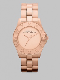 A classic timepiece with a logo etched bezel. Quartz movementWater resistant to 5 ATMRound brushed rose goldtone stainless steel case, 36.5mm (1.5)Logo bezelBrushed rose goldtone dialSecond hand Brushed rose goldtone stainless steel link braceletImported A classic timepiece with a logo etched bezel. Quartz movementWater resistant to 5 ATMRound brushed rose goldtone stainless steel case, 36.5mm (1.5)Logo bezelBrushed rose goldtone dialSecond hand Brushed rose goldtone stainless steel link braceletImported