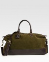 Large suede carryall with top handles, removable shoulder strap and an enforced leather bottom, perfect for last minute trips and weekend getaways.Zip closureDouble top handlesRemovable shoulder strapInterior pocketSuede20W x 12H x 8DImported