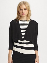 A simply elegant design that's poised to be the perfect finishing touch to an outfit.Open-front designThree-quarter sleevesAbout 23 from shoulder to hem55% rayon/45% nylonDry cleanImported Model shown is 5'9½ (176cm) wearing US size Small. A simply elegant design that's poised to be the perfect finishing touch to an outfit.Open-front designThree-quarter sleevesAbout 23 from shoulder to hem55% rayon/45% nylonDry cleanImported Model shown is 5'9½ (176cm) wearing US size Small.