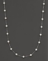 Beaded 14 Kt. white gold necklace with fresh water pearl stations.