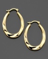 These 14k gold hoop earrings feature a sultry swirl pattern with a slightly elongated shape. Approximate drop: 1 inch. Approximate diameter: 1/2 inch.