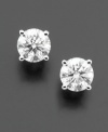 Two carats worth of sparkling diamond in each ear frames the face perfectly. For a style always in season, snap up round-cut diamond studs (2 ct. t.w.) set in 14k white gold. Approximate diameter: 6-1/2 mm.