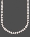 An elegant necklace with endless beauty featuring cultured freshwater pearls (9-10 mm) and a 14k gold clasp. Necklace by Belle de Mer. Approximate length: 22 inches.