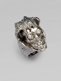 An ultra-edgy design with a Swarovski crystal accented skull sitting in a snake's mouth. BrassSwarovski crystalsMade in Italy An ultra-edgy design with a Swarovski crystal accented skull sitting in a snake's mouth. BrassSwarovski crystalsMade in Italy