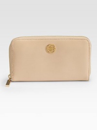 Classic zip-around style in textured leather with a signature logo medallion.Zip-around closureOne inside zip pocketThree inside open pocketsEight credit card slotsLeather lining7½W X 4H X 3/4DImported Classic zip-around style in textured leather with a signature logo medallion.Zip-around closureOne inside zip pocketThree inside open pocketsEight credit card slotsLeather lining7½W X 4H X 3/4DImported