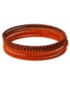 Wrap your wrists in stackable style! Kenneth Cole New York's bracelet set features 6 separate bangles highlighting multi-thread color. Crafted in silver tone mixed metal. Approximate diameter: 2-1/2 inches.