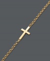 Stay true to your faith. Studio Silver's adds a simple twist on a traditional cross design by flipping it on its side. This delicate style can be worn alone to make a symbolic statement, or paired with other designs for a trendy layered effect. Bracelet crafted in 18k gold over sterling silver. Approximate length: 7-1/4 inches.
