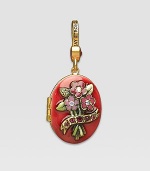 Ruby-colored CRYSTALLIZED - Swarovski Elements sparkle on this handcrafted, hand-enameled birthstone locket that opens to hold a favorite photo. Crystal Enamel 18k goldplated brass & brass-plated pewter Month indicated on the back Length, about 1¼ Width, about 1 Spring clip clasp Made in USA