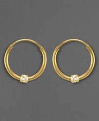 Put a sparkle in your favorite little girl's eye with these earrings. Round-cut cubic zirconia accents are set in 14k gold (12 mm). Put a sparkle in your favorite little girl's eye with these earrings. Round-cut cubic zirconia accents are set in 14k gold (12 mm).