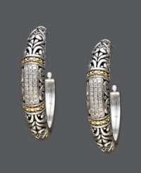 Balissima by Effy Collection takes an ordinary pair of hoops to a whole new level. Crafted in 18k gold and sterling silver, this extraordinary design features scrolling filigree and round-cut diamonds (1/4 ct. t.w.). Approximate diameter: 1-1/4 inches. Balissima by Effy Collection takes an ordinary pair of hoops to a whole new level. Crafted in 18k gold and sterling silver, this extraordinary design features scrolling filigree and round-cut diamonds (1/4 ct. t.w.). Approximate diameter: 1-1/4 inches.