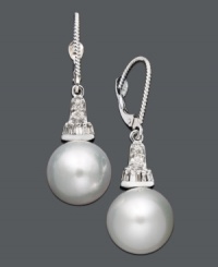 Illuminate your look with polish and shine. These elegant drop earrings highlight a cultured South Sea pearl (10-11 mm) and sparkling round-cut diamond (1/5 ct. t.w.). Crafted in 14k white gold. Approximate drop: 1-1/4 inches. Illuminate your look with polish and shine. These elegant drop earrings highlight a cultured South Sea pearl (10-11 mm) and sparkling round-cut diamond (1/5 ct. t.w.). Crafted in 14k white gold. Approximate drop: 1-1/4 inches.