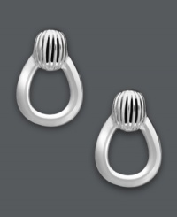 Reinvented style. Giani Bernini adds a modern touch to a stylish 80's classic. These petite doorknocker stud earrings come in polished sterling silver. Approximate diameter: 3/4 inch. Reinvented style. Giani Bernini adds a modern touch to a stylish 80's classic. These petite doorknocker stud earrings come in polished sterling silver. Approximate diameter: 3/4 inch.