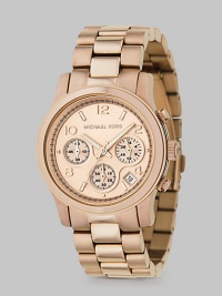 A sporty chronograph timepiece with date display in a rose goldplated stainless steel.Quartz movement Water resistant to 5 ATM Rose goldplated round stainless steel case, 38mm, (1.49) Light rose gold chronograph dial Date display between 4 and 5 o'clock Arabic numeral and index hour markers Second hand Rose goldplated link bracelet Deployment buckle Imported A sporty chronograph timepiece with date display in a rose goldplated stainless steel.Quartz movement Water resistant to 5 ATM Rose goldplated round stainless steel case, 38mm, (1.49) Light rose gold chronograph dial Date display between 4 and 5 o'clock Arabic numeral and index hour markers Second hand Rose goldplated link bracelet Deployment buckle Imported