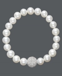 A traditional design receives a sparkling touch. Cultured freshwater pearls (8-9 mm) in shimmery white hues adorn this chic stretch bracelet, while a clear crystal fireball adds extra glamour. Approximate diameter: 3-1/2 inches. A traditional design receives a sparkling touch. Cultured freshwater pearls (8-9 mm) in shimmery white hues adorn this chic stretch bracelet, while a clear crystal fireball adds extra glamour. Approximate diameter: 3-1/2 inches.