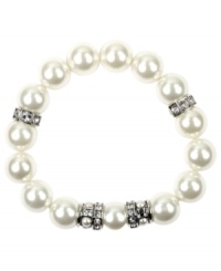 Exude timeless elegance in effortless, slip-on style. Givenchy bracelet features polished glass pearls accented by silver tone mixed metal beads and sparkling crystals. Bracelet stretches to fit wrist. Approximate diameter: 2-1/2 inches. Exude timeless elegance in effortless, slip-on style. Givenchy bracelet features polished glass pearls accented by silver tone mixed metal beads and sparkling crystals. Bracelet stretches to fit wrist. Approximate diameter: 2-1/2 inches.