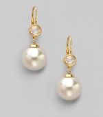 A perfectly round sphere of white organic pearl, sparkling stud and 18k gold vermeil for a look of timeless elegance.12mm round white pearls Cubic zirconia 18k gold vermeil Drop, about 1½ Ear wire Made in Spain 
