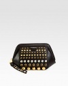 Round studs adds casual-cool edge to this leather silhouette in a portable size. Studded wrist strap, 6 dropTop zip closureOne inside zip pocketFully lined11W X 7H X 3DImported
