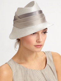 Sophisticated asymmetric design with pleated silk band.StrawWide silk bandGraduated brim from 1¼ to 3Spot cleanMade in Italy Sophisticated asymmetric design with pleated silk band.StrawWide silk bandGraduated brim from 1¼ to 3Spot cleanMade in Italy