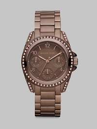 Rich chocolate colored timepiece with sparking crystals and a multi-function dial. Quartz movementWater resistant to 10 ATMCrystal accented round chocolate ion-plated stainless steel case, 33mm (1.3)Crystal accented bezelChocolate multi-function dialNumeral and bar hour markersSecond hand Chocolate ion-plated stainless steel link braceletImported Rich chocolate colored timepiece with sparking crystals and a multi-function dial. Quartz movementWater resistant to 10 ATMCrystal accented round chocolate ion-plated stainless steel case, 33mm (1.3)Crystal accented bezelChocolate multi-function dialNumeral and bar hour markersSecond hand Chocolate ion-plated stainless steel link braceletImported