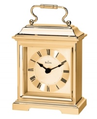 This formal carriage clock by Bulova adds elegance to an end table or side board. Rectangular spun and brushed gold tone aluminum case features a curved handle at top. Gold tone dial displays black Roman numerals and two hands. This formal carriage clock by Bulova adds elegance to an end table or side board. Rectangular spun and brushed gold tone aluminum case features a curved handle at top. Gold tone dial displays black Roman numerals and two hands.