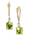 An elegant accent piece in your favorite hue. These stunning long drop earrings feature square-cut peridot (2-1/5 ct. t.w.) and round-cut diamond accents. Set in 14k gold. Approximate drop: 2 inches.