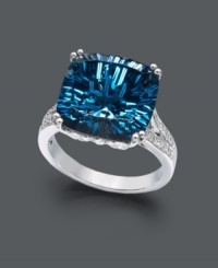 Add a stylish splash to your look with this cool, blue hue. A cushion-cut blue topaz (12 ct. t.w.) sparkles amidst round-cut diamond accents. Crafted in sterling silver. Size 7. Add a stylish splash to your look with this cool, blue hue. A cushion-cut blue topaz (12 ct. t.w.) sparkles amidst round-cut diamond accents. Crafted in sterling silver. Size 7.