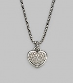 From the Hearts Collection. A sweet heart with a center of pavé diamonds hangs from a sterling silver cable bale and box chain. Diamonds, 0.23 tcw Sterling silver Chain length, about 17 Pendant length, about ¾ including bale Lobster clasp Made in USA