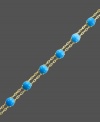 Double up on polish, while infusing color into your look. Carlo Viani's chic, double strand bracelet highlights turquoise beads (12-1/2 mm) set in 14k gold. Approximate length: 7-1/2 inches.