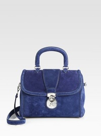 Suede bag with top handle and flap closure.Top handle, 4 dropDetachable shoulder strap, 16½ dropPush-lock flap closure with zipperOne inside zip pocketTwo inside open pocketsSatin lining10½W X 8½H X 5½DMade in Italy Suede bag with top handle and flap closure.Top handle, 4 dropDetachable shoulder strap, 16½ dropPush-lock flap closure with zipperOne inside zip pocketTwo inside open pocketsSatin lining10½W X 8½H X 5½DMade in Italy