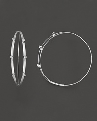 With a sleek front split and gleaming diamond accents, these 14 Kt. gold earrings add just the right amount of shine to your style. Designed by Lana. With a sleek front split and gleaming diamond accents, these 14 Kt. gold earrings add just the right amount of shine to your style. Designed by Lana.