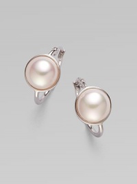 Glistening mabe pearl faceted in sterling silver makes for a timeless design. 10mm mabe pearl Sterling silver Drop, about ½ Ear wire back Made in Spain Glistening mabe pearl faceted in sterling silver makes for a timeless design. 10mm mabe pearl Sterling silver Drop, about ½ Ear wire back Made in Spain