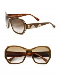 These modern, acetate frames feature two-tone leather inset temples. Available in brown striped with brown gradient lens. Leather inset logo temples100% UV protectionMade in Italy These modern, acetate frames feature two-tone leather inset temples. Available in brown striped with brown gradient lens. Leather inset logo temples100% UV protectionMade in Italy