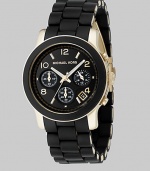 A new take on a traditional design, this gold IP stainless steel bracelet is wrapped in contrast polyurethane. Chronograph movement Water resistant to 100 meters Round case, 38mm Black glossy dial with Arabic numerals and stick indexes Date display between 4 and 5 o'clock Second hand Stainless steel link bracelet wrapped in polyurethane Bracelet width, about 20mm, .79 Imported
