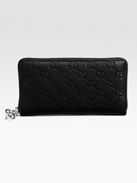 Zip around wallet with interlocking G detail in guccissima leather with leather trim/interior and nickel hardware.Zip around closure Twelve card slots Three bill compartments Zip coin pocket Fully lined 7W X 3½H X ½D Made in Italy Zip around wallet with interlocking G detail in guccissima leather with leather trim/interior and nickel hardware.Zip around closure Twelve card slots Three bill compartments Zip coin pocket Fully lined 7W X 3½H X ½D Made in Italy