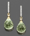 Elevate your style with look-at-me elegance. These gorgeous drop earrings feature briolette-cut green quartz (8-1/5 ct. t.w.) with pretty diamond accents at the top. Set in 14k gold. Approximate drop: 1 inch.
