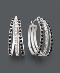 You'll be an instant fan of these haute hoops. Set in 14k white gold, black and white diamond accents create sweet contrast in these fan-shaped hoops. Approximate diameter: 1 inch. You'll be an instant fan of these haute hoops. Set in 14k white gold, black and white diamond accents create sweet contrast in these fan-shaped hoops. Approximate diameter: 1 inch.