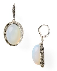 A classically glam look from Judith Jack. Glittering crystals frame large opal stones with luminescent milky depth - the perfect earrings for chiffon. A classically glam look from Judith Jack. Glittering crystals frame large opal stones with luminescent milky depth - the perfect earrings for chiffon.