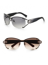 Split, semi-rimless lens with crystal GG logo and metal temple. Available in black with grey lens or brown with brown lens. 100% UV protection Made in Italy Split, semi-rimless lens with crystal GG logo and metal temple. Available in black with grey lens or brown with brown lens. 100% UV protection Made in Italy