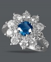 A wonderful depiction of nature, EFFY Collection's sparkling flower-shaped ring features a round-cut blue diamond at center (3/4 ct. t.w.) surrounded by round-cut white diamonds as petals (1-3/4 ct. t.w.). Band crafted in 14k white gold.