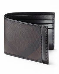 Wallet with one bill slot and six card slots. Two miscellaneous slots. Subtle smoke check pattern, leather trim detail on side and inside. Wallet with one bill slot and six card slots. Two miscellaneous slots. Subtle smoke check pattern, leather trim detail on side and inside.
