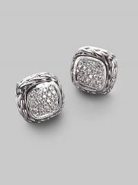 A striking square of textured sterling silver, richly set with a center of pavé diamonds with accents of 18k white gold. Diamonds 0.34 tcw Sterling silver and 18k white gold About ½ square Post back Imported